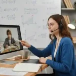 Online math tutoring: a teacher explaining formulas via video conference.